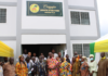 • Some officials in front of the accommodation facility for the medical officers
