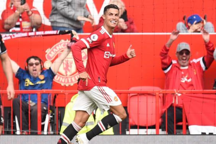 Cristiano Ronaldo celebrates after scoring the opening goal of the match between Manchester United and Newcastle.