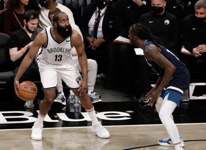 Brooklyn Nets guard James Harden (L) is defended by Minnesota Timberwolves forward Taurean Prince (R) in the first half of the NBA preseason basketball game between the Brooklyn Nets and the Minnesota Timberwolves at Barclays Center in Brooklyn, New York, USA, 14 October 2021. EPA/Peter Foley SHUTTERSTOCK OUT