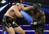 LAS VEGAS, NEVADA - FEBRUARY 22: Deontay Wilder punches Tyson Fury during their Heavyweight bout for Wilder's WBC and Fury's lineal heavyweight title on February 22, 2020 at MGM Grand Garden Arena in Las Vegas, Nevada. (Photo by Al Bello/Getty Images)