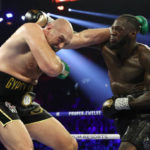 LAS VEGAS, NEVADA - FEBRUARY 22: Deontay Wilder punches Tyson Fury during their Heavyweight bout for Wilder's WBC and Fury's lineal heavyweight title on February 22, 2020 at MGM Grand Garden Arena in Las Vegas, Nevada. (Photo by Al Bello/Getty Images)