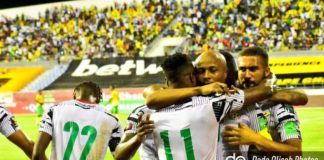 Andre Ayew celebrates with teammates