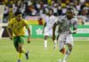 Jordan Ayew watches on