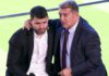 Aguero was consoled by Barcelona president Joan Laporta during the news conference