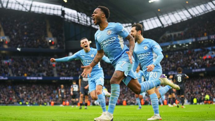 Raheem Sterling of Manchester City celebrates after scoring their side's first goal from the penalty spot during the Premier League match between Manchester City and Wolverhampton Wanderers at Etihad Stadium on December 11, 2021 in Manchester, England Image credit: Getty Images