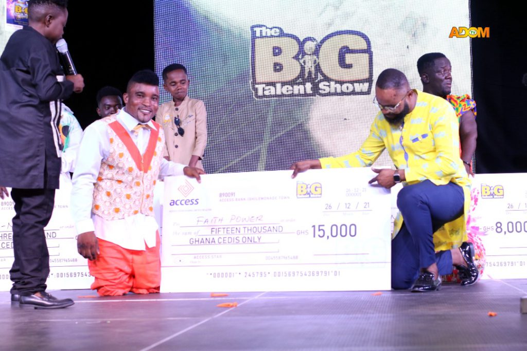 Faith Power receives his GHC 15,000 cheque prize
