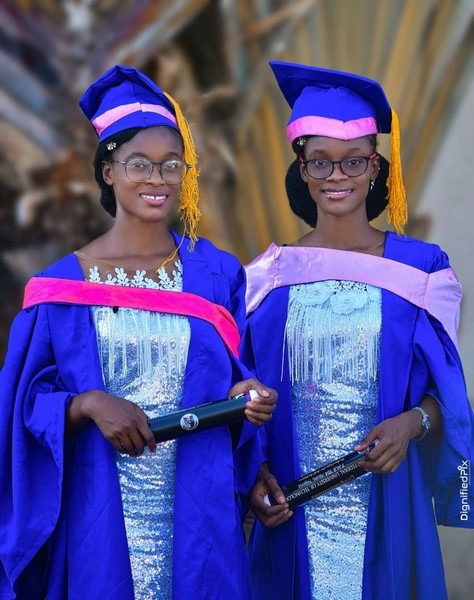 Adorable twins bag first-class degrees from the same university