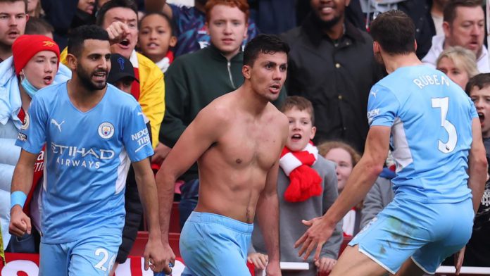 Rodri of Manchester City celebrates after scoring their side's second goal during the Premier League match between Arsenal and Manchester City at Emirates Stadium Image credit: Getty Images