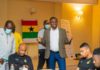 Sports Minister speaking to Black Stars players