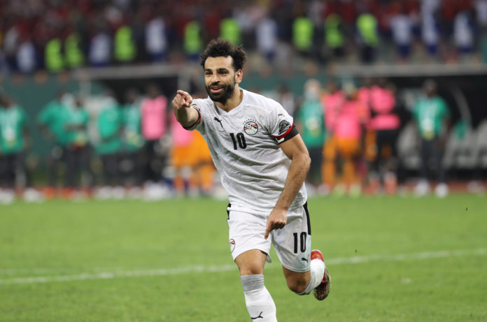 Mohamed Salah of Egypt celebrates victory after scoring winning penalty during the 2021 Africa Cup of Nations Afcon Finals Last 16 match between Ivory Coast and Egypt at Japoma Stadium, Douala, Cameroon on 26 January 2022 ©Gavin Barker/BackpagePix