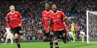 Fred celebrates with Anthony Elanga and Scott McTominay of Manchester United after scoring their team's third goal during the Premier League match between Leeds United and Manchester United at Elland Road on February 20, 2022 Image credit: Getty Images