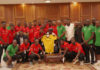 Asante Kotoko players and technical team with President Kufour
