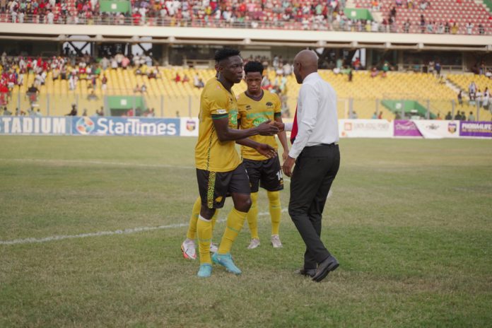 Kotoko coach congratulating players after Hearts of Oak game