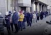 People in Russia queued for several hours to take out their money ( Image: Sky News)