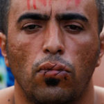 Migrants sew mouths shut in quest for Mexico passage to US border