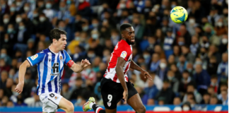 Real Sociedad's defender Aritz Elustondo (L) in action against Athletic Bilbao's striker Inaki Williams (R) during the Spanish LaLiga soccer match between Real Sociedad and Athletic Club Bilbao held at Reale Arena stadium, in San Sebastian, northern Spain, 31 October 2021. EPA/Juan Herrero