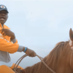 Medikal rides a horse in his "Ghost" music video