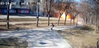 The missile destroyed a tram and partially hit a residential building ( Image: APonomarenko/Twitter)