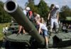 Kids can climb over Russian army tanks at the park (Image: AFP via Getty Images)