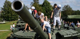 Kids can climb over Russian army tanks at the park (Image: AFP via Getty Images)