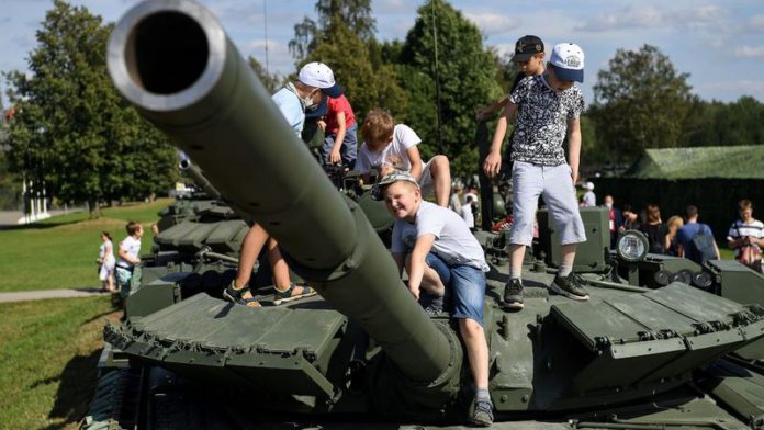 Kids can climb over Russian army tanks at the park (Image: AFP via Getty Images)