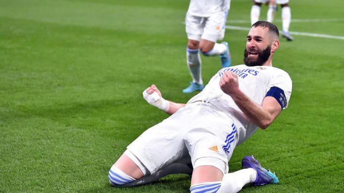 Karim Benzama of Real Madrid reacts after scoring during the UEFA Champions League Round Of Sixteen Leg Two match between Real Madrid and Paris Saint-Germain at Estadio Santiago Bernabeu on March 09, 2022 in Madrid, Spain. Image credit: Getty Images