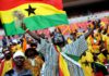 A Ghanian supporter cheers on January 20, 2013 before the start of a 2013 Africa Cup of Nations football match between Ghana and the Democratic Republic of Congo at the Nelson Mandela Bay Stadium in Port Elizabeth. AFP PHOTO / STEPHANE DE SAKUTIN