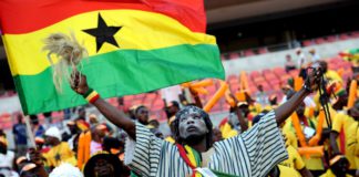 A Ghanian supporter cheers on January 20, 2013 before the start of a 2013 Africa Cup of Nations football match between Ghana and the Democratic Republic of Congo at the Nelson Mandela Bay Stadium in Port Elizabeth. AFP PHOTO / STEPHANE DE SAKUTIN