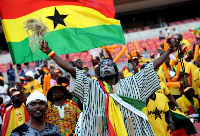 A Ghanian supporter cheers on January 20, 2013 before the start of a 2013 Africa Cup of Nations football match between Ghana and the Democratic Republic of Congo at the Nelson Mandela Bay Stadium in Port Elizabeth. AFP PHOTO / STEPHANE DE SAKUTIN