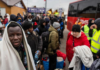 People fleeing the violence in Ukraine are seen at the Medyka pedestrian border crossing in eastern Poland on February 27, 2022. | Credit: Wojtek Radwanski/AFP/Getty Images