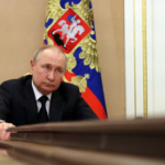Russian President Vladimir Putin attends a meeting with government members via a video link in Moscow, Russia March 10, 2022. Sputnik/Mikhail Klimentyev/Kremlin via REUTERS