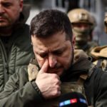 President Volodymyr Zelensky broke down in tears as he visited Bucha today ( Image: AFP via Getty Images)