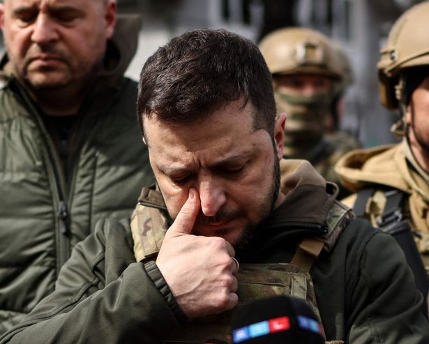 President Volodymyr Zelensky broke down in tears as he visited Bucha today ( Image: AFP via Getty Images)