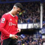 Ronaldo appeared to knock a young fan's phone to the ground as he walked down the tunnel at Goodison