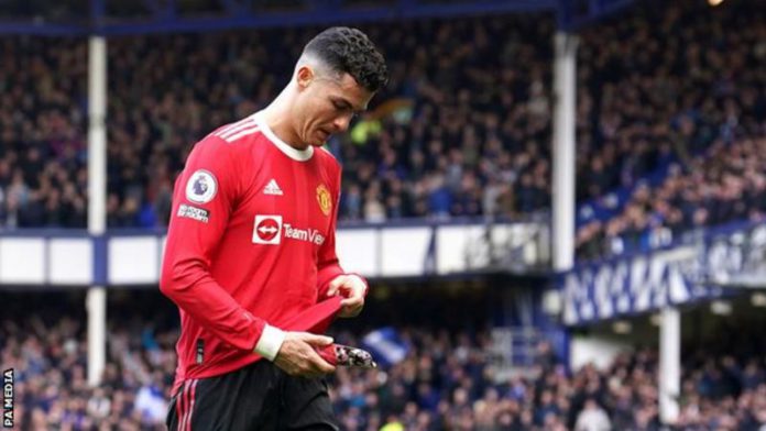 Ronaldo appeared to knock a young fan's phone to the ground as he walked down the tunnel at Goodison