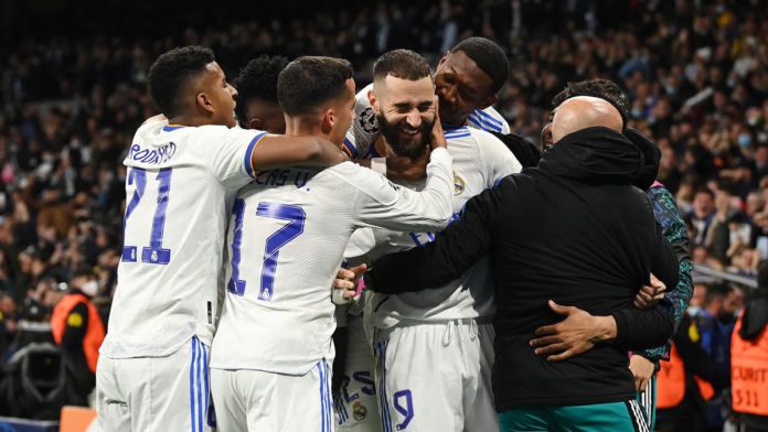 MADRID, SPAIN - APRIL 12: Karim Benzema of Real Madrid celebrates with teammates after scoring their team's second goal during the UEFA Champions League Quarter Final Leg Two match between Real Madrid and Chelsea FC at Estadio Santiago Bernabeu on April 1 Image credit: Getty Images