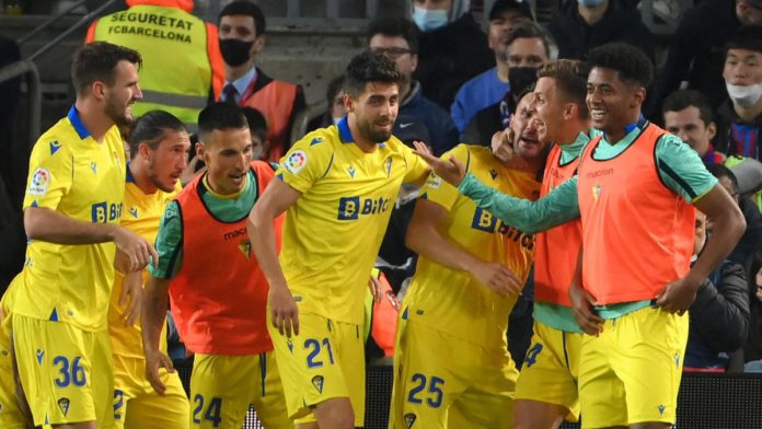 Lucas Perez (3rdR) celebrates with teammates after scoring a goal Image credit: Getty Images