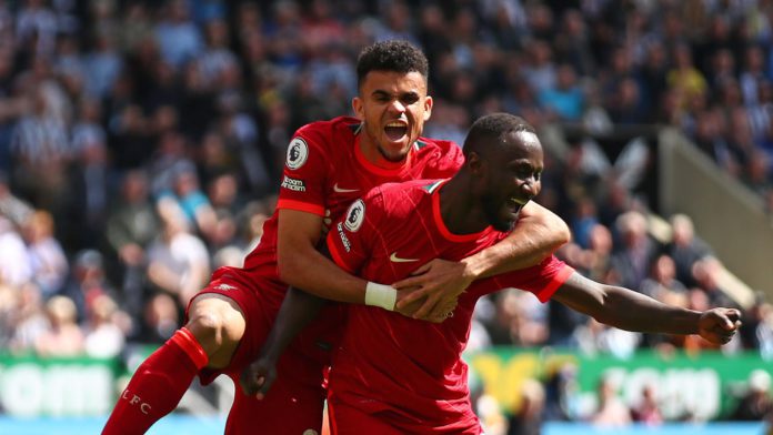 Naby Keita of Liverpool celebrates scoring the opening goal with team-mate Luis Diaz during the Premier League match between Newcastle United and Liverpool at St. James' Park Image credit: Getty Images