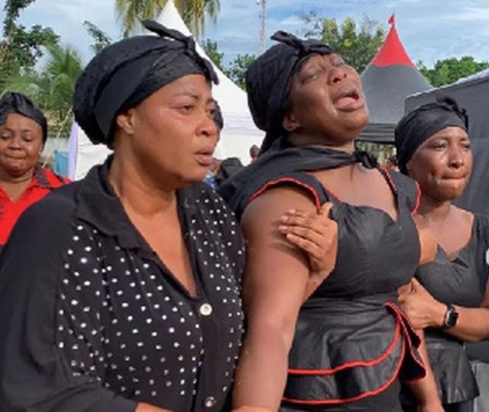 Actress, Gloria Osei Sarfo (middle) mourns late mother