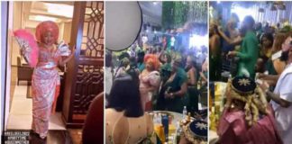 Singer Kcee sprays money on actress Rita Dominic. Photo: @iam_ikeonyema