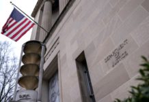 The Department of Justice building in Washington, D.C., U.S. Photographer: Stefani Reynolds/Bloomberg via Getty Images