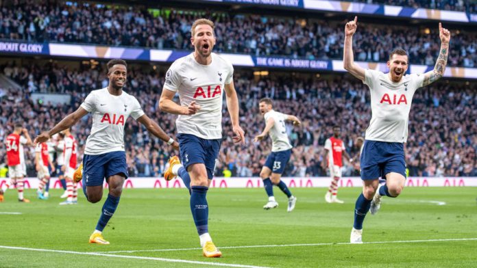 Harry Kane of Tottenham Hotspur celebrates with Pierre-Emile Hojbjerg, Ryan Sessegnon after scoring 2nd goal during the Premier League match between Tottenham Hotspur and Arsenal at Tottenham Hotspur Stadium on May 12, 2022 in London, United Kingdom. Image credit: Getty Images