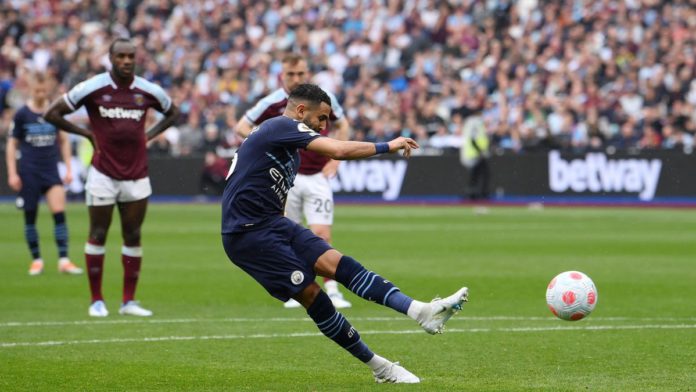 Riyad Mahrez of Manchester City has their penalty saved by Lukasz Fabianski of West Ham United (not pictured) during the Premier League match between West Ham United and Manchester City at London Stadium on May 15, 2022 in London, England. Image credit: Getty Images