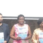 From left: Nnamdi Iwuora, Senior Programme Manager of IOM; David Shokry, Resource Management Officer of IOM; Myra Togobo, Officer in charge of Data Management, Evaluation and Registration at the Office of the United Nations Resident Coordinator; Abibatou Wane, the IOM’s Chief of Mission for Ghana, Benin and Togo, and Adelaide Anno-Kumi, Chief Director of the Ministry of the Interior, diplaying the IOM Ghana Country Strategy for 2022 to 2025 at the launch in Accra