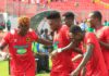 Etouga celebrates with Asante Kotoko teammates