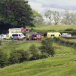 Emergency services by Bentham Road near Burton in Lonsdale, where a helicopter has crashed into a field (Image: Ben Lack Photography Ltd)