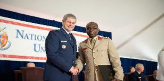 Gen Michael T Plehn, President of NDU in a handshake with Col Isaac Amponsah Source: Ghana Armed Forces