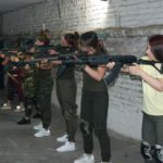Fearless Ukrainian women determined to fight Russian invaders with machine guns Women learn how to use Kalashnikov assault rifles in Zaporizhzhia, southeastern Ukraine ( Image: AFP via Getty Images)