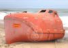 The grounded rescue boat found on Coast shoreline Source: GBC