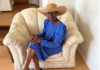 Vicky Umodu sits on the chair at her home in Colton, Calif., where she found $36,000 in cash stuffed inside the seat cushion. (Diseph Mgborogwu)